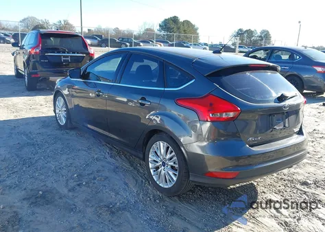 2015 Ford Focus Titanium from USA, damaged, VIN 1FADP3N23FL218472